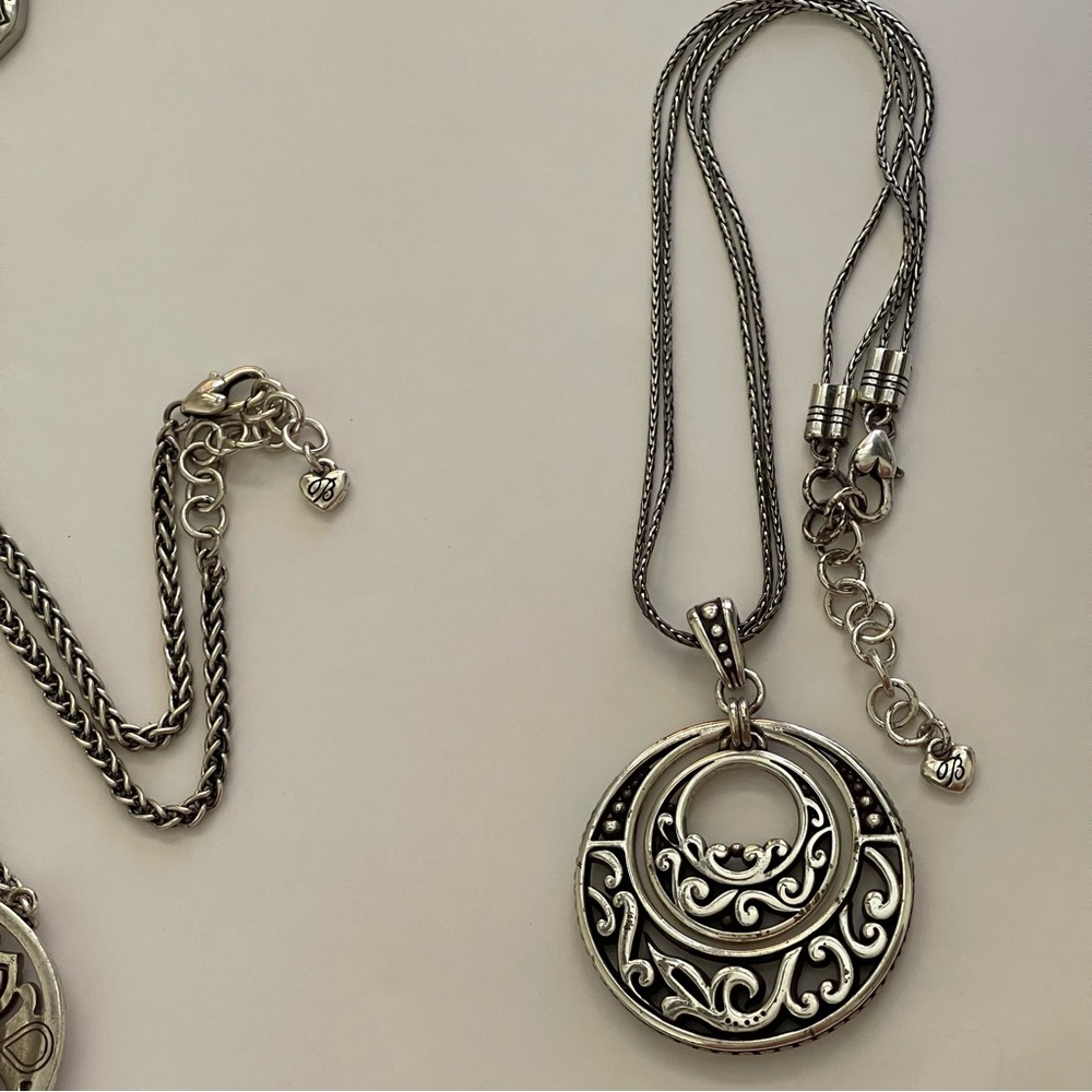 Brighton Necklace: Silver Pendant Necklace with Intricate Double Hoop Design